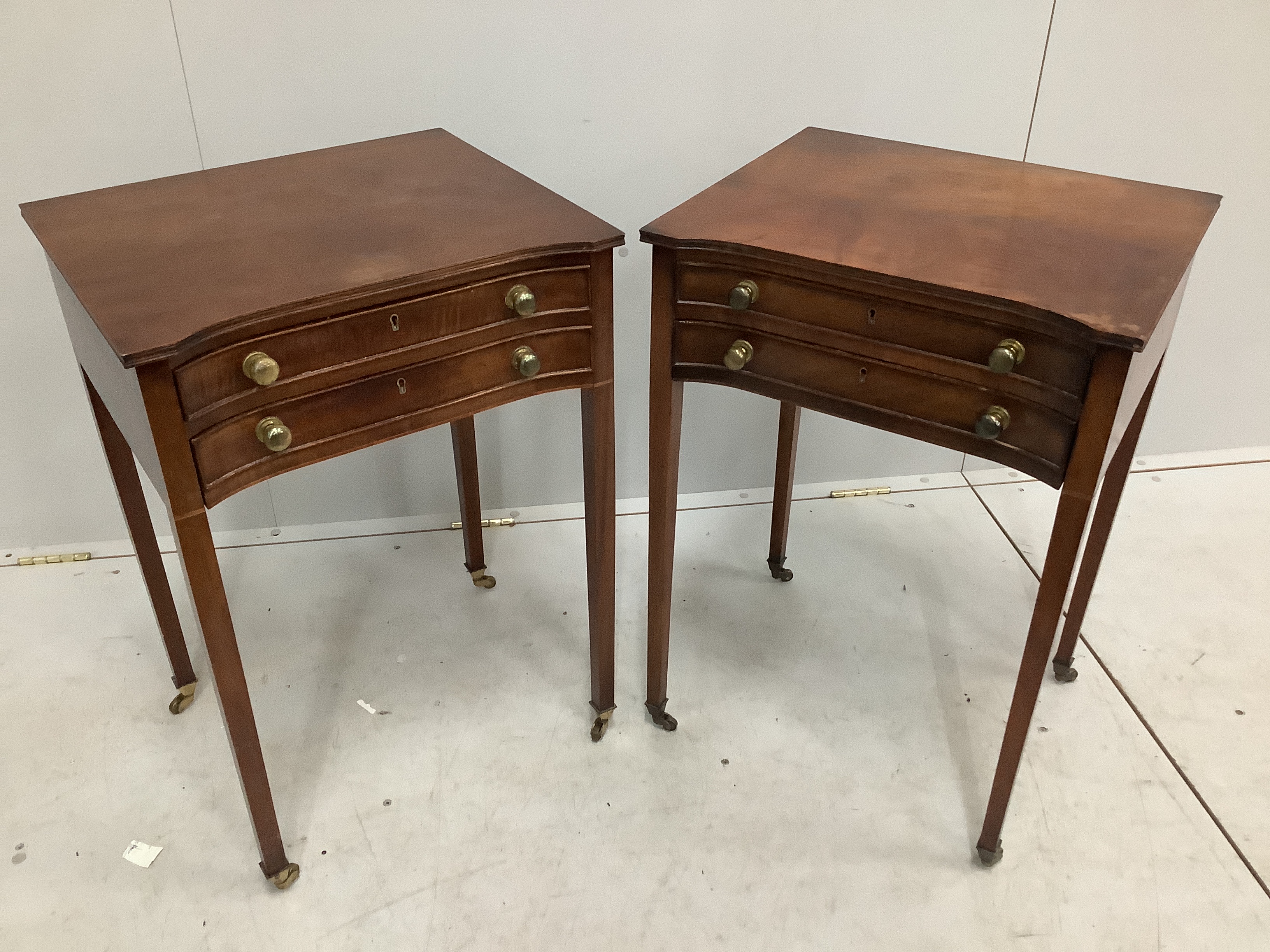 A pair of reproduction George III style mahogany two drawer bedside tables, width 49cm, depth 42cm, height 72cm
